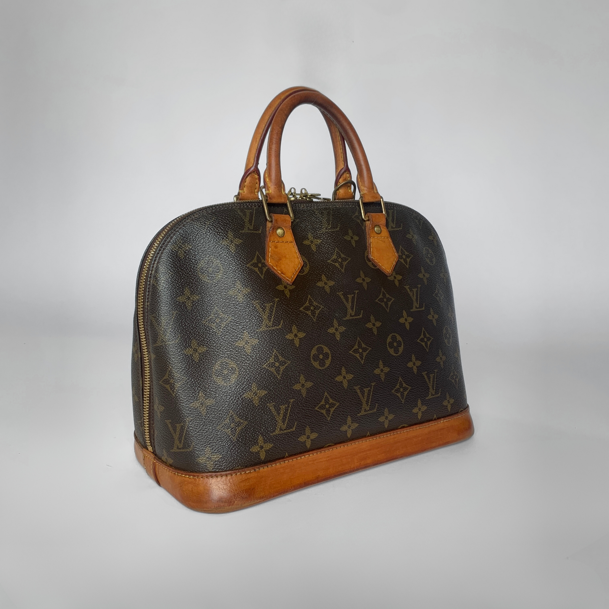 Louis Vuitton Louis Vuitton Alma Monogram Canvas - Handbags - Etoile Luxury Vintage