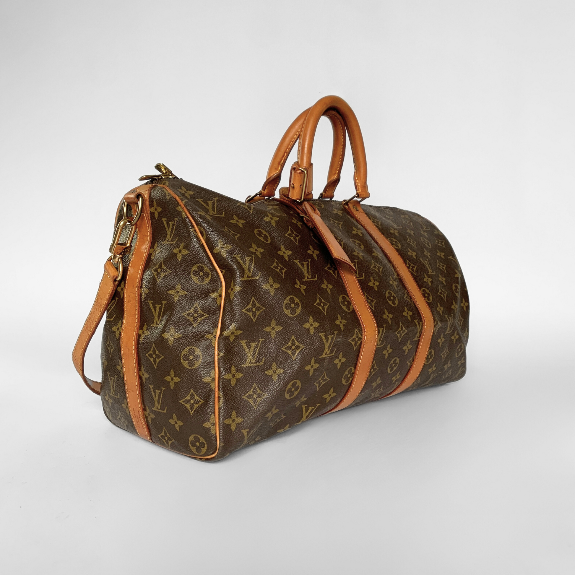 Louis Vuitton Louis Vuitton Keepall 45 Bandouli&egrave;re Monogram Canvas - Handbags - Etoile Luxury Vintage